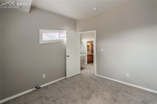 unfurnished bedroom featuring carpet