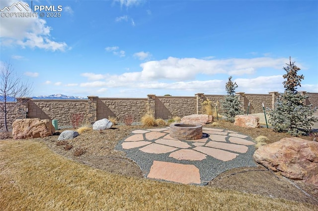 8542 Noreen Falls Dr, Colorado Springs, CO 80924 - view of patio / terrace featuring an outdoor fire pit