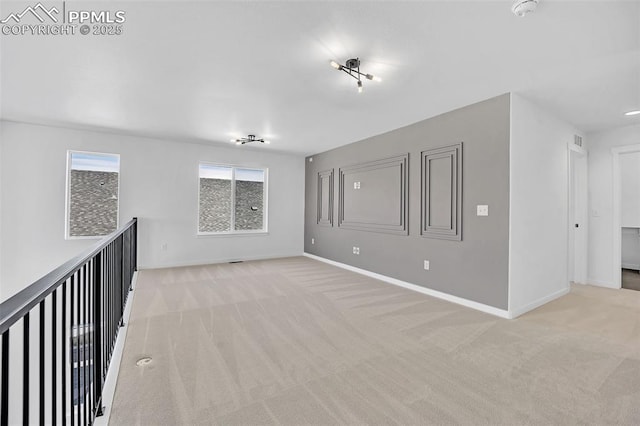 8542 Noreen Falls Dr, Colorado Springs, CO 80924 - spare room with light carpet, baseboards, and a smoke detector