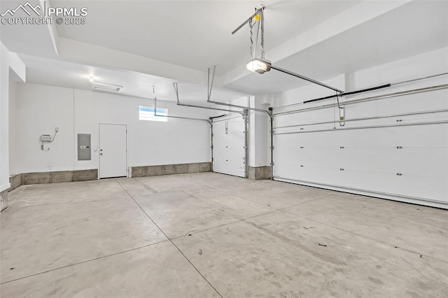 8542 Noreen Falls Dr, Colorado Springs, CO 80924 - garage featuring electric panel and a garage door opener