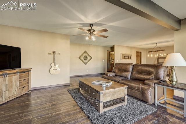 living room with ceiling fan and dark hardwood / wood-style flooring