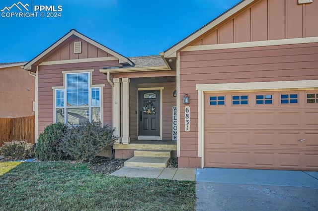 view of front of property with a garage