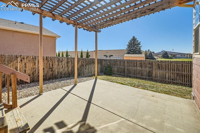 view of patio featuring a pergola