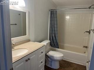 full bathroom with vanity, toilet, and shower / tub combo with curtain