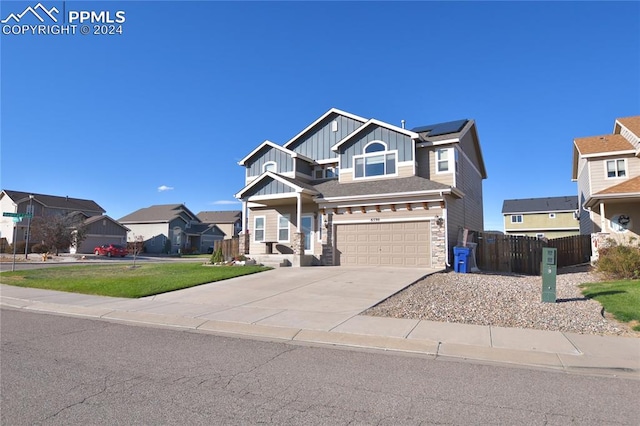 craftsman house with a garage