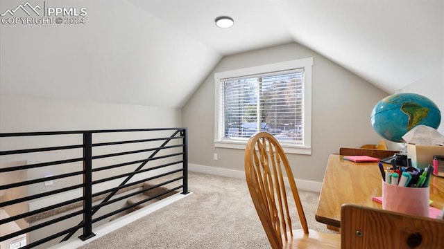 office area with light colored carpet and lofted ceiling