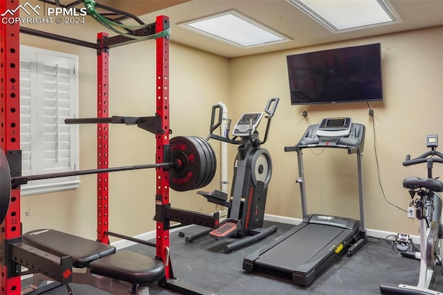 exercise area with baseboards