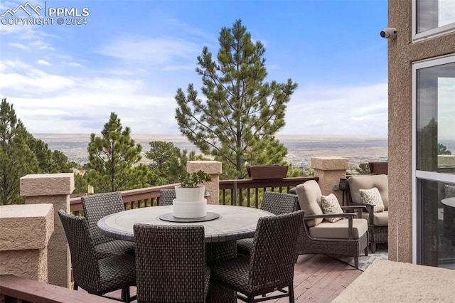 deck featuring outdoor dining space