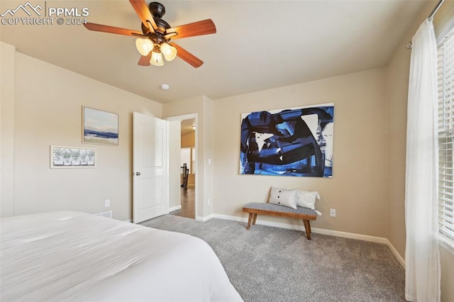 bedroom featuring ceiling fan and carpet floors