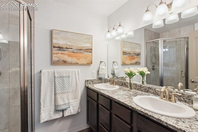 bathroom featuring vanity and walk in shower