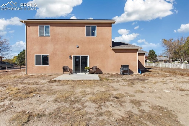 rear view of house featuring a patio area