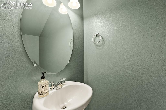 2616 Gilpin Ave, Colorado Springs, CO 80910 - bathroom featuring a sink and a textured wall