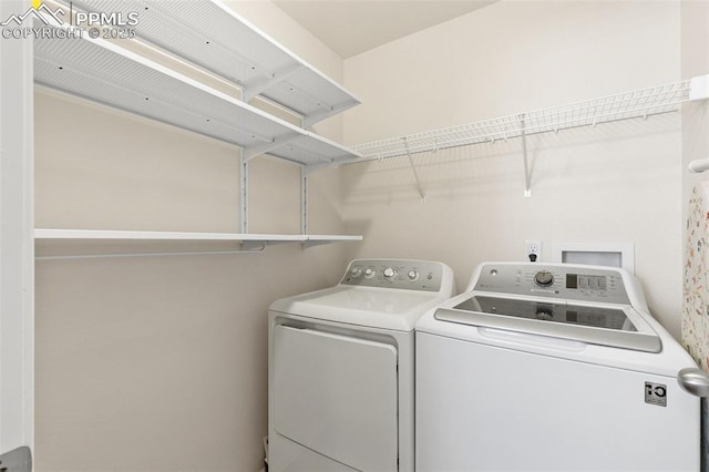 2616 Gilpin Ave, Colorado Springs, CO 80910 - laundry room with washing machine and clothes dryer