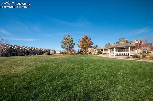 2616 Gilpin Ave, Colorado Springs, CO 80910 - view of grassy yard featuring a gazebo and a residential view