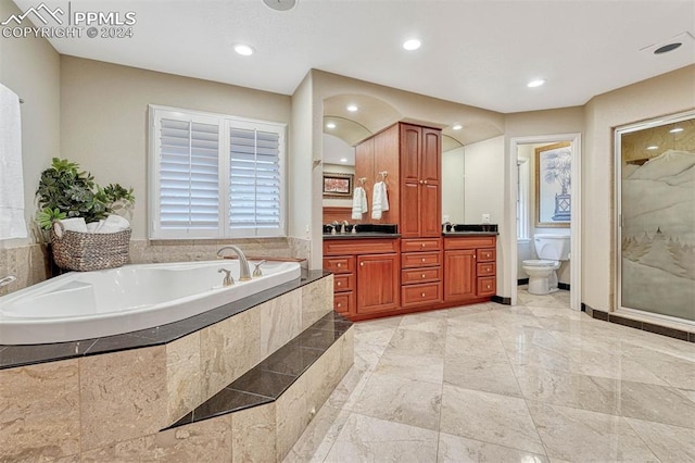 full bathroom featuring vanity, toilet, and plus walk in shower