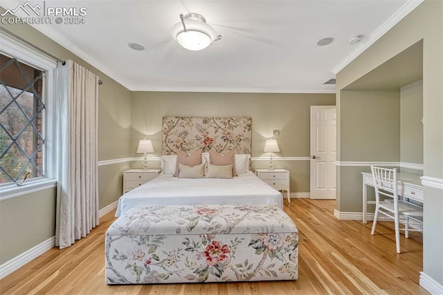 bedroom with ornamental molding and light wood-type flooring