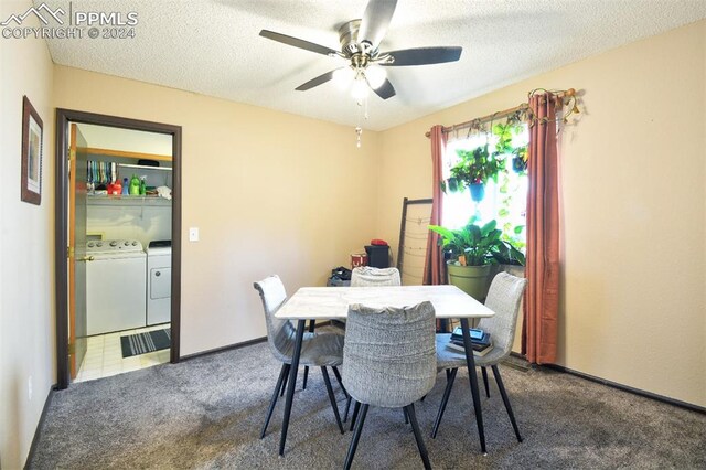 dining space with washer and clothes dryer, carpet flooring, ceiling fan, and a textured ceiling