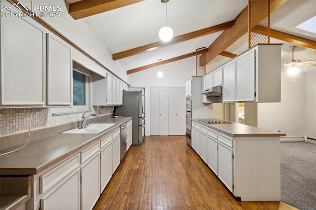 kitchen featuring white cabinets, tasteful backsplash, light wood-type flooring, vaulted ceiling with beams, and sink