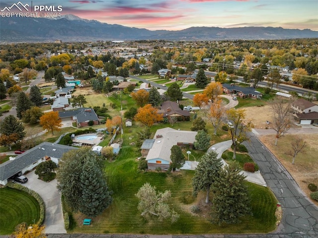 aerial view at dusk with a mountain view