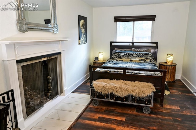 bedroom featuring hardwood / wood-style floors