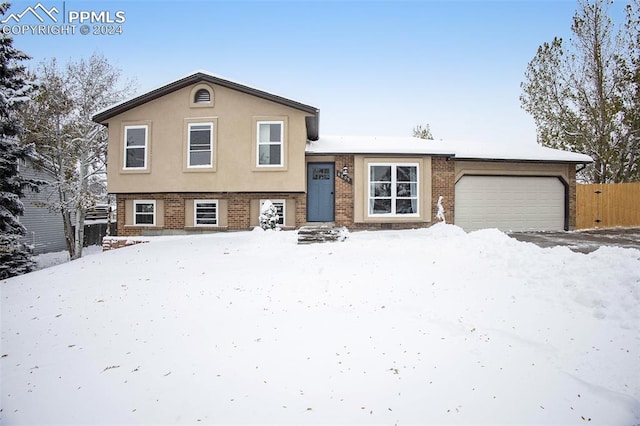 tri-level home featuring a garage