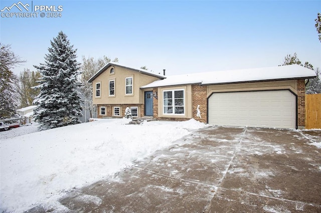 tri-level home featuring a garage