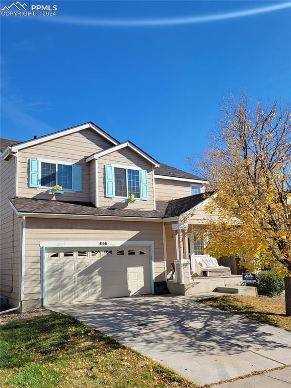 view of front of house with a garage