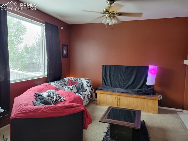 carpeted bedroom with ceiling fan