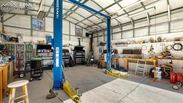 garage with a workshop area