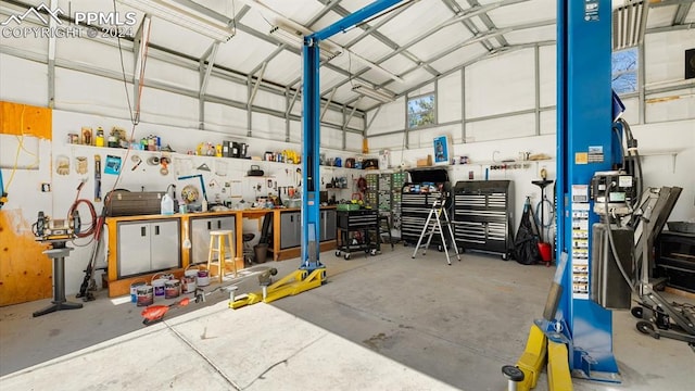 garage with a workshop area