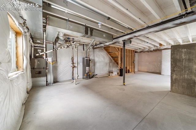 basement featuring gas water heater