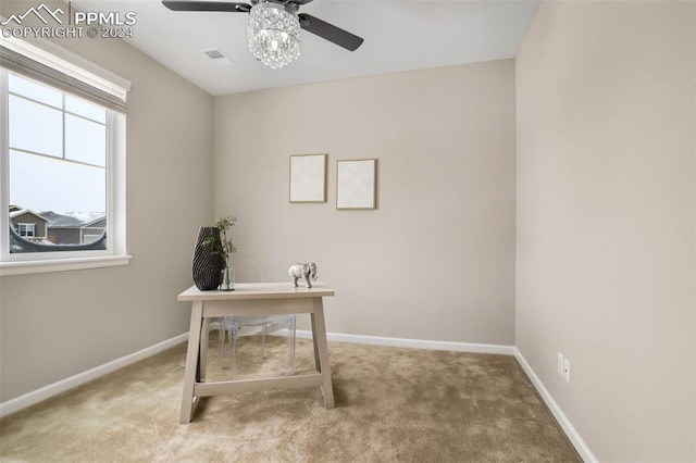 office space with ceiling fan and carpet flooring