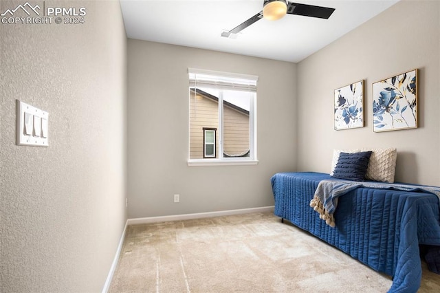 sitting room with light colored carpet and ceiling fan