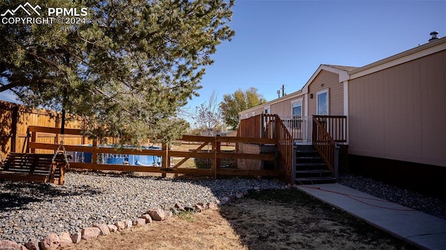 view of yard with a deck