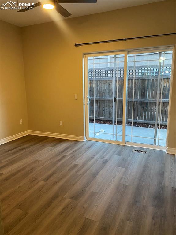 empty room featuring hardwood / wood-style floors