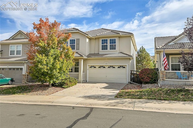 view of front of home with a garage