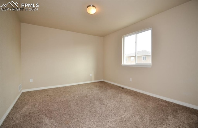 view of carpeted spare room