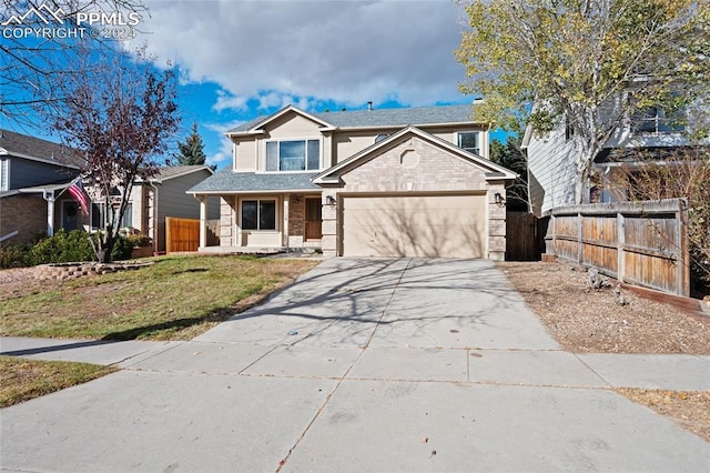 view of front of home with a front lawn