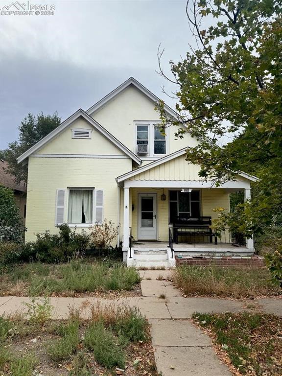 bungalow-style home with covered porch