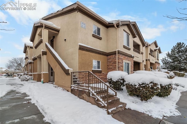 view of snow covered building