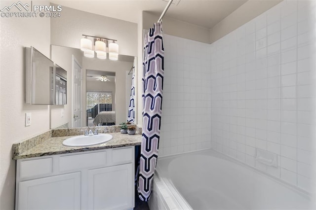 bathroom with vanity and shower / bath combo