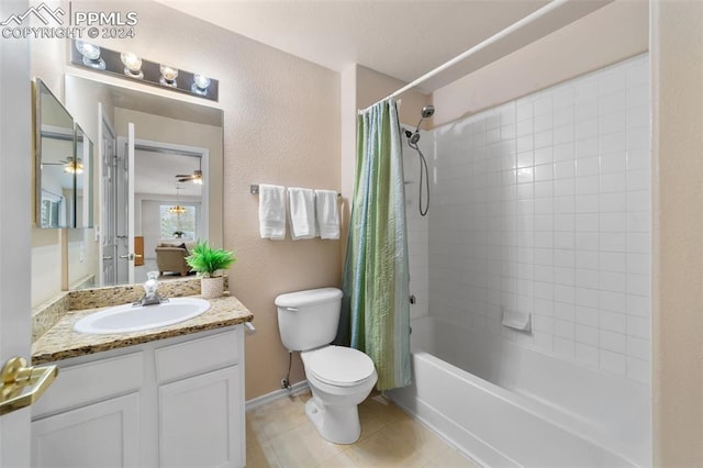 full bathroom with toilet, vanity, and shower / bath combo