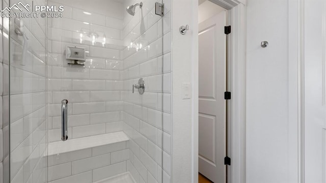 bathroom featuring an enclosed shower