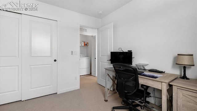 office area featuring washer / dryer