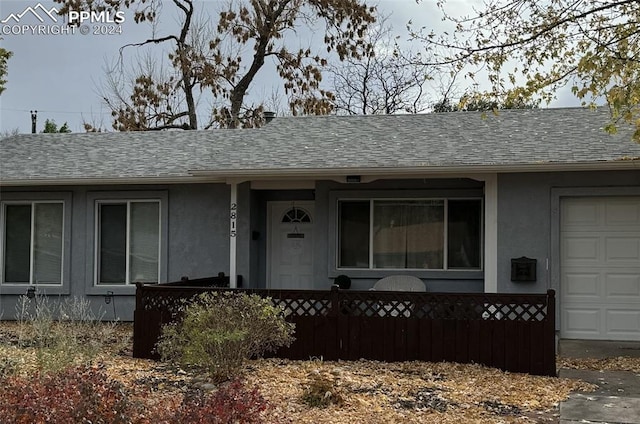 ranch-style house with a garage