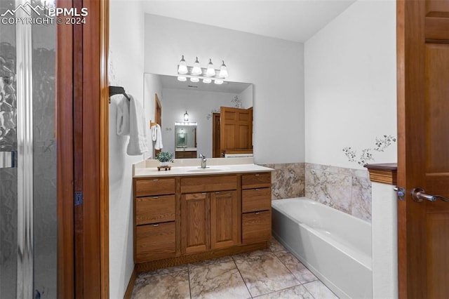 bathroom with a bathing tub and vanity