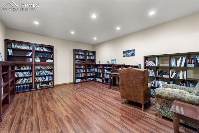 home office with wood-type flooring