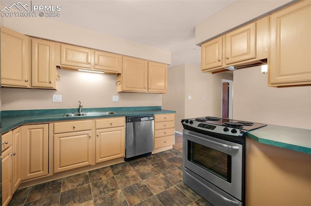 kitchen featuring appliances with stainless steel finishes and sink