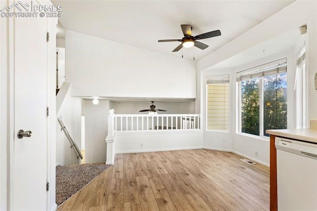 interior space with light hardwood / wood-style floors and ceiling fan