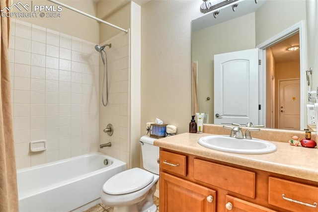 full bathroom with vanity, toilet, and shower / tub combo with curtain